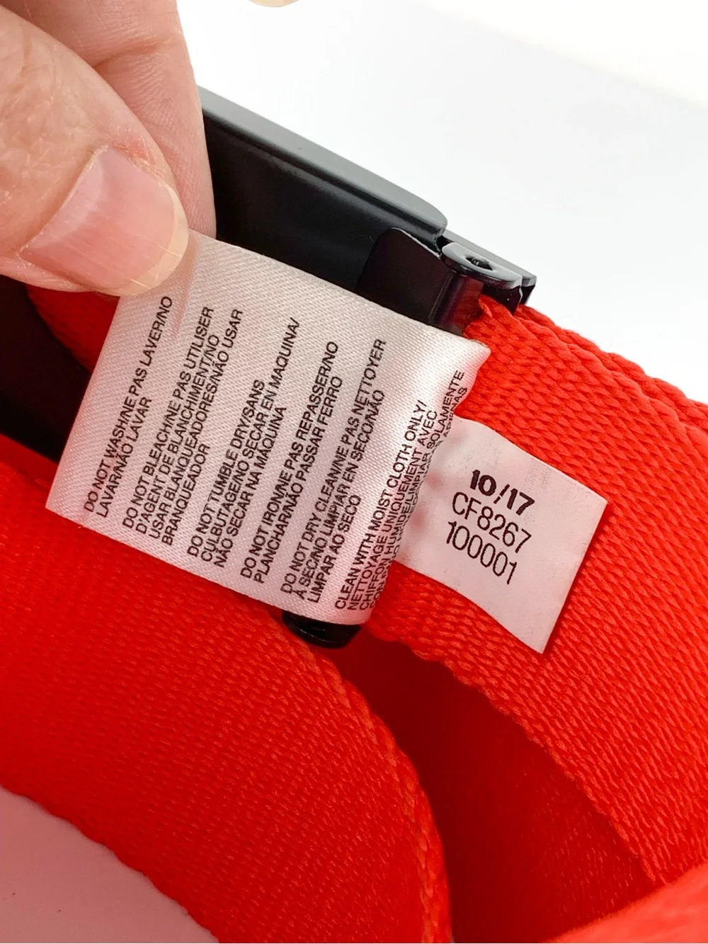 Adidas golf belt red & black with adjustable red nylon strap and flip-top buckle